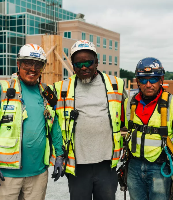 3 Clark craft workers at a jobsite in PPE