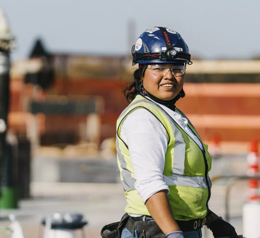 Woman construction worker skilled craft employee works on a Clark jobsite